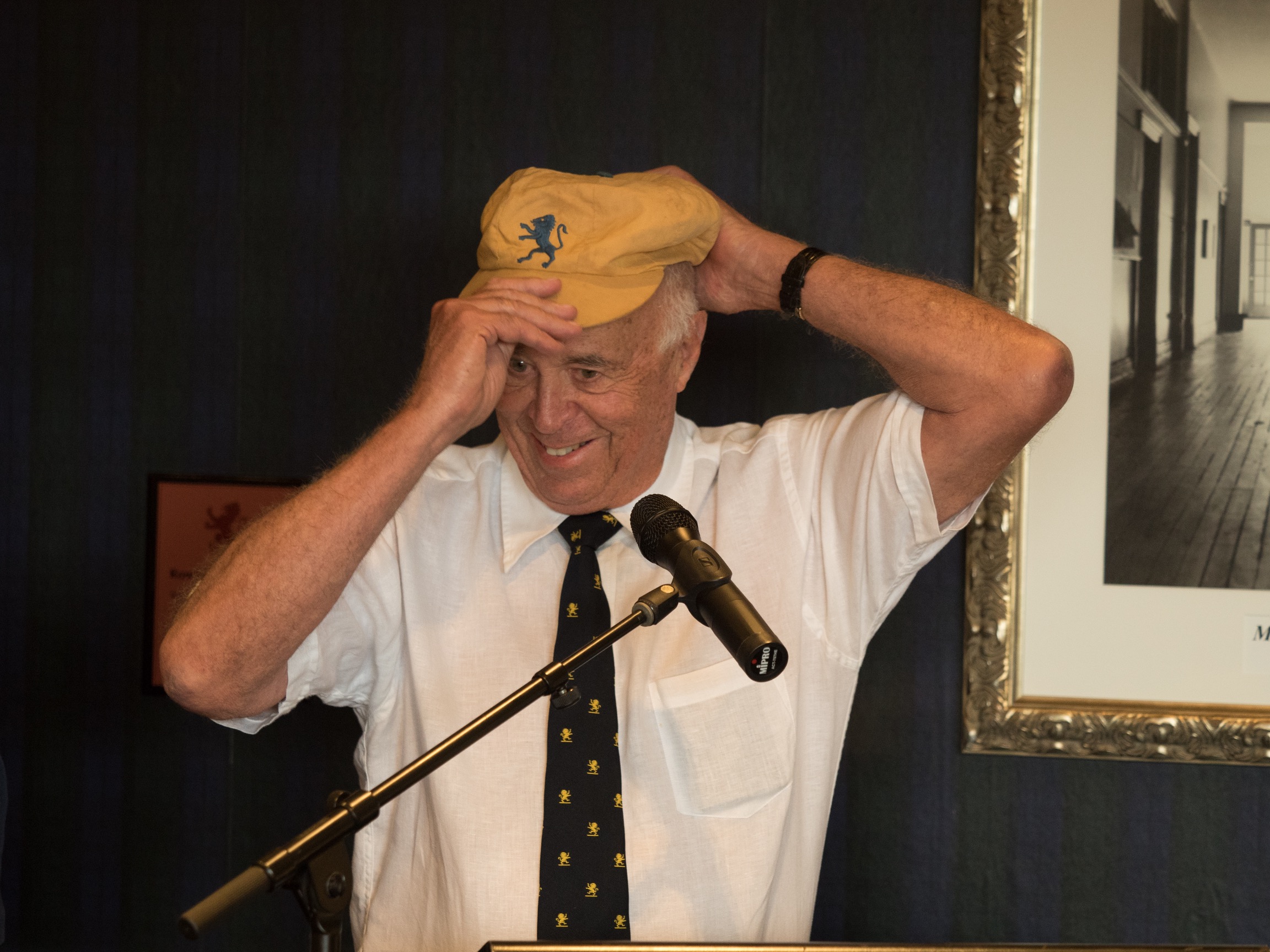 Peter Howarth OAM wears a Cricket cap